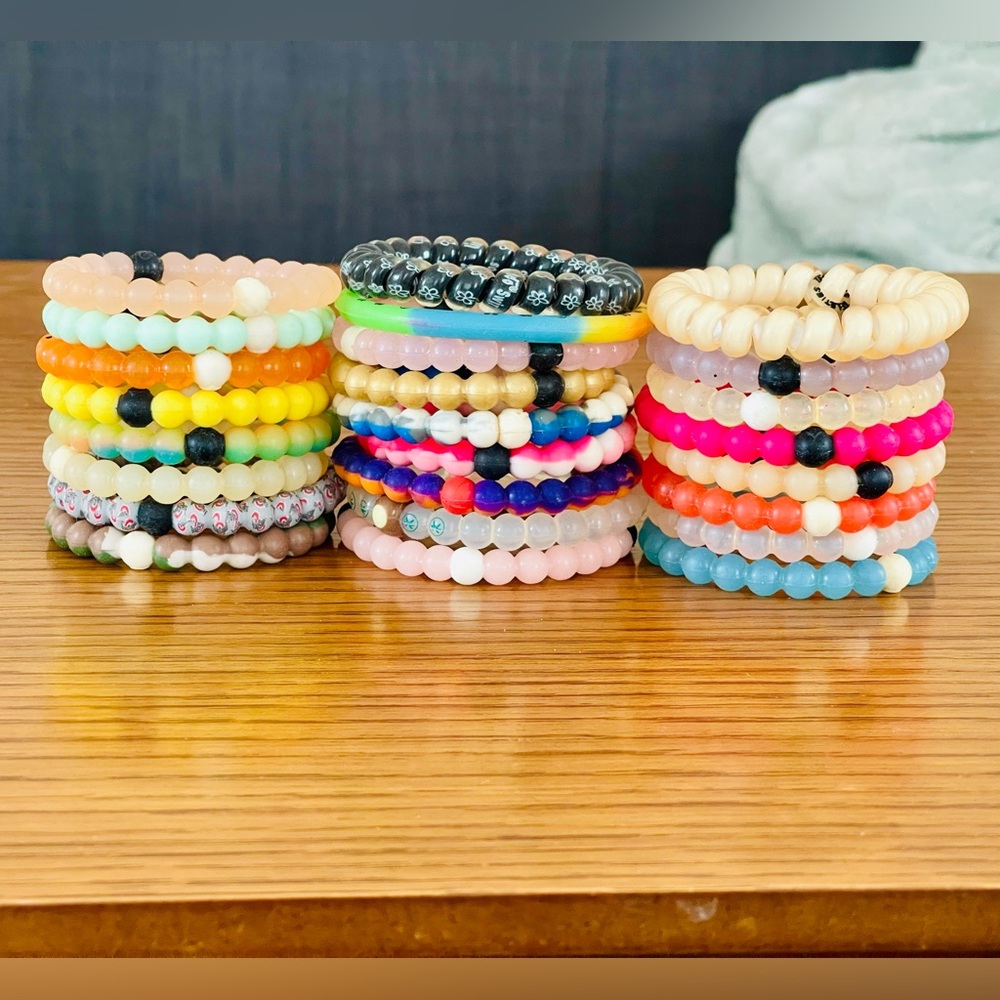 Lot of 25 Silicone Bracelets, 19 are Lokai, see description